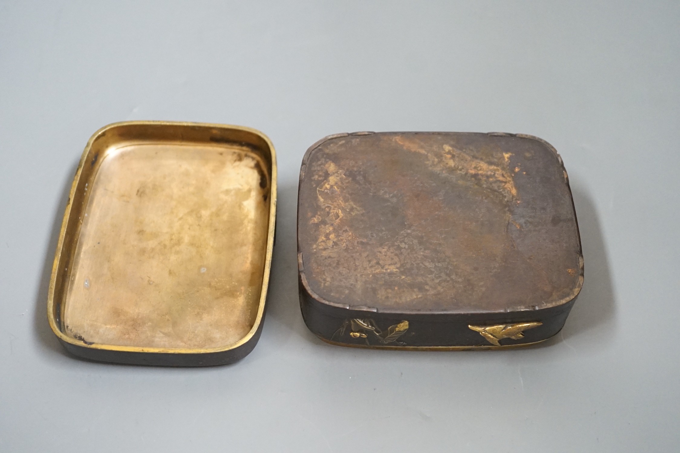 A Japanese bronze and mixed metal box, Meiji period, 12cm wide 9.5cm deep